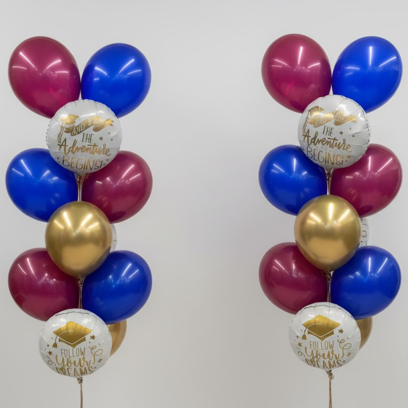 Colorful balloons with graduation-themed messages in a store setting