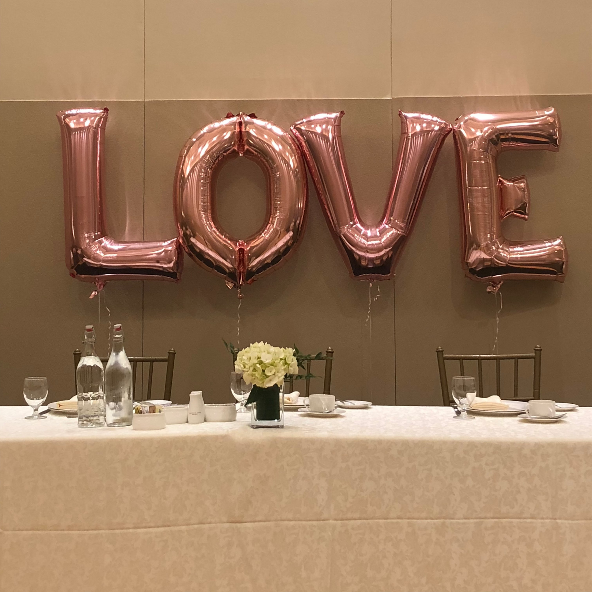 Rose gold 'LOVE' balloons 